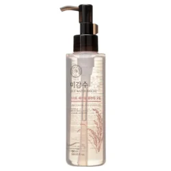 Bottle of Rice Water Bright Light Cleansing Oil for makeup removal and glowing skin