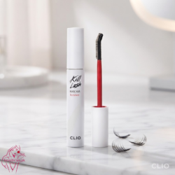 CLIO Kill Lash Mascara Remover 8.5g white tube with red brush applicator open on marble
